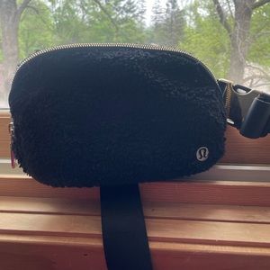 Black Lululemon fleece belt bag